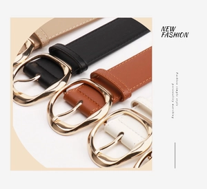Close-up of four colorful PU leather belts featuring gold oval buckles and fine stitching