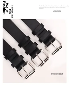 Close-up of black punk style belts with silver pin buckle and durable faux leather texture