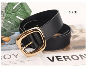 Detail of 3.8cm black leather belt with a polished gold-tone square buckle on magazines