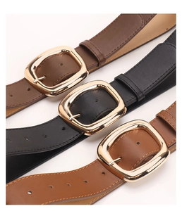 Detailed view of 3.8cm wide leather belts in black and brown with gold square buckles
