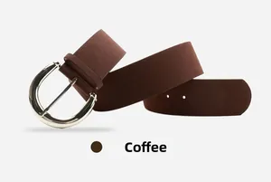 Detail of coffee brown suede leather belt with polished silver metal U-buckle for women