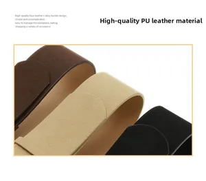 Detail of premium suede PU leather belts in brown, beige, and black with alloy buckles