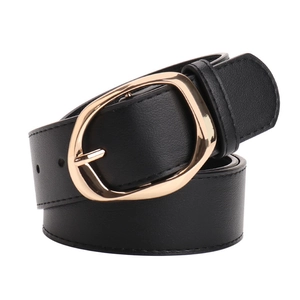 Minimalist black PU leather belt for women featuring a large golden oval buckle on white