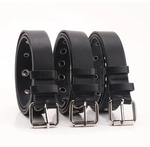 Three punk style black faux leather belts with silver grommets and square pin buckles