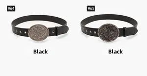 Detail view of Western vintage black leather belts with carved 964 and 965 buckles