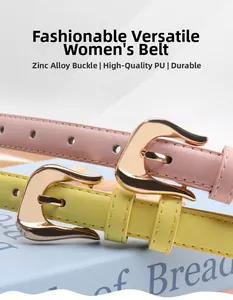 Detail of pink and yellow PU leather belts with durable zinc alloy buckles