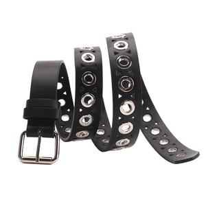 Punk style black faux leather belt with silver metal eyelets and a square buckle for jeans