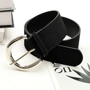 Women's vintage black suede wide belt with silver D-ring buckle on white background
