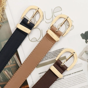 Tre cinture da donna premium in nero e marrone con fibbie ovali dorate lucide