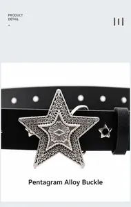 Close-up of black punk belt featuring a large silver star alloy buckle with embossed details