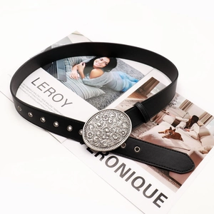 Western vintage black leather belt with engraved silver buckle and eyelet detailing