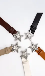 Detail of punk style skinny leather belts with silver star buckles in five assorted colors