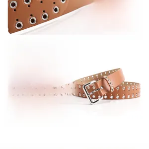Close-up of brown leather belt with double row of silver metal eyelets and square buckle
