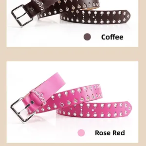 Detail of coffee and rose red punk belts with silver metal eyelets and square pin buckle