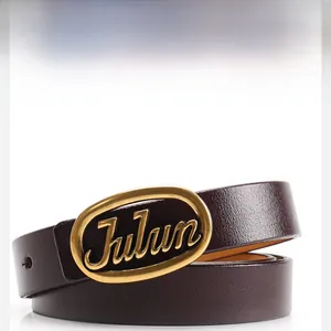 Close-up of gold oval Julun letter buckle and coffee brown leather belt texture