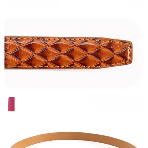 Macro shot of brown glossy leather belt featuring diamond quilted texture and stitching