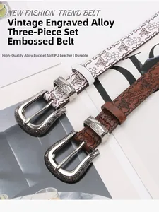 Détail d'une ceinture vintage en cuir PU avec motifs papillon gaufrés et boucle en alliage