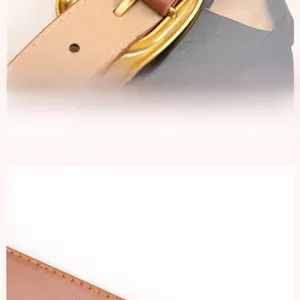 Detail view of brown leather belt featuring neat stitching and solid golden alloy buckle