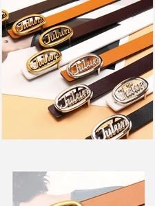 Detailed view of leather belts with oval metal buckles and Julun artistic lettering