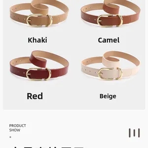 Detail of four thin leather belts in khaki, camel, red, and beige with gold oval buckles