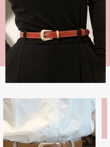Detail of slim retro leather belts with engraved golden buckles on black and white outfits