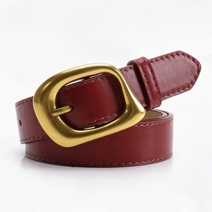 Minimalist burgundy leather belt with matte gold square buckle and fine edge stitching