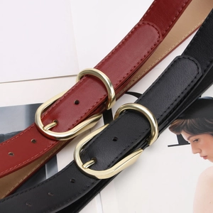 Slim minimalist leather belts for women in black and burgundy with gold buckles