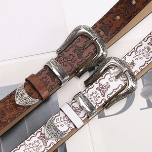 Ceinture vintage en cuir avec motifs papillons embossés et boucle en métal sculpté