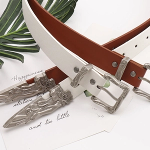Western vintage leather belt set with embossed silver buckles in white and dark brown
