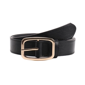 Minimalist black leather belt for women featuring a gold rectangle pin buckle and fine texture