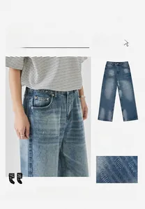Dettaglio dei jeans vintage con lavaggio manuale ed effetto baffi per un look retrò