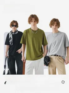 Three men wearing casual loose crew neck short sleeve T-shirts in black, olive, and grey colors
