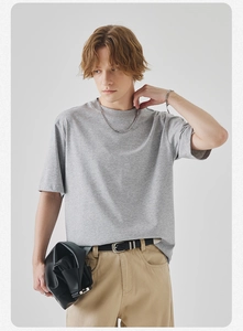 Detail view of heather gray men's short sleeve T-shirt with a premium crew neck finish
