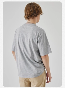 Detailed back view of a grey crew neck t-shirt featuring premium cotton texture and stitching