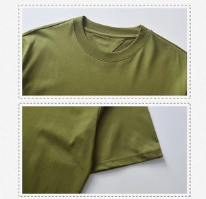 Detail of reinforced triangular neck stitch and durable double-needle sleeve hem on olive tee