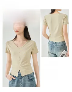 Detailed view of slim fit V-neck tee with button decor and unique split hem design