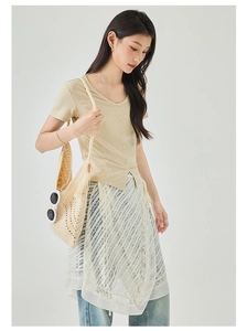 Summer outfit featuring khaki V-neck knit top with lace skirt over blue wide-leg jeans