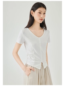 Detail of white V-neck short sleeve T-shirt with button front and inverted V-cut hem
