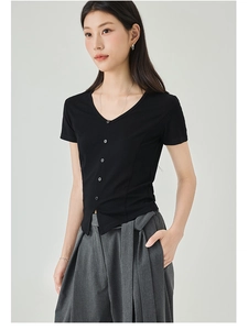 Detail of a black V-neck slim-fit T-shirt featuring button accents and a side slit hem
