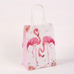 White kraft paper gift bag with pink flamingo illustration and striped side detail