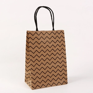 Vertical brown kraft paper gift bag with black chevron pattern and rope handles