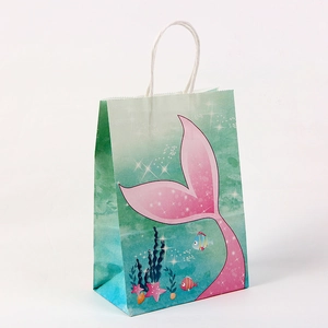 Ocean themed kraft paper party gift bag with pink mermaid tail and sea patterns