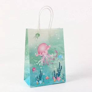 Ocean themed kraft paper gift bag with jellyfish and sea life prints on blue base