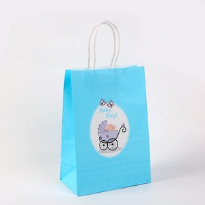 Detail view of sky blue baby boy gift paper bag with white twisted rope handles and cute motifs