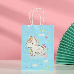 Light blue kraft paper gift bag with cartoon unicorn print and white twisted handles