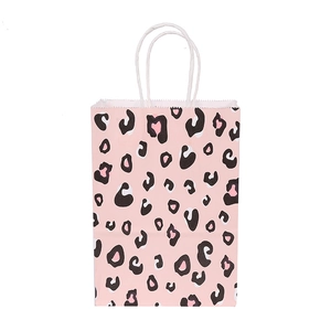Pink leopard print kraft paper gift bag with white twisted handles for party favors