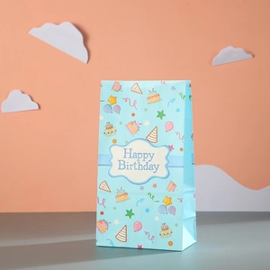 Detail of light blue Happy Birthday paper gift bag with cute hand-drawn party patterns