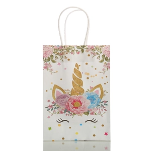 Vertical white kraft paper gift bag with floral unicorn print and white twisted handles