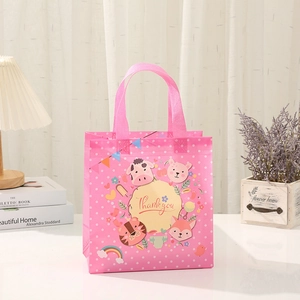 Pink polka dot non-woven gift bag with cute cartoon animals and Thank You text