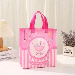 Pink non-woven baby shower gift bag with cute carriage print and stripe pattern
